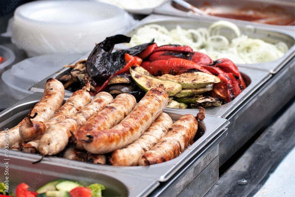 Smoked vegetables, sausages, grilled sausages