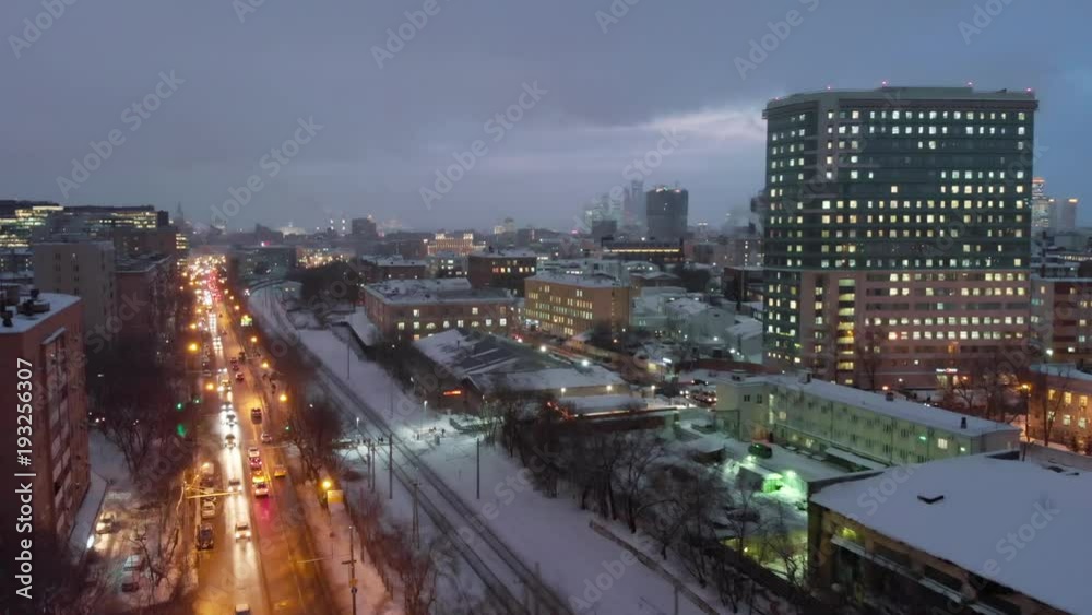 Moscow night aerial shot along railways, late evening Russian capital cityscape street view. Moscow night aerial shot along railways, late evening Russian capital cityscape street view.
