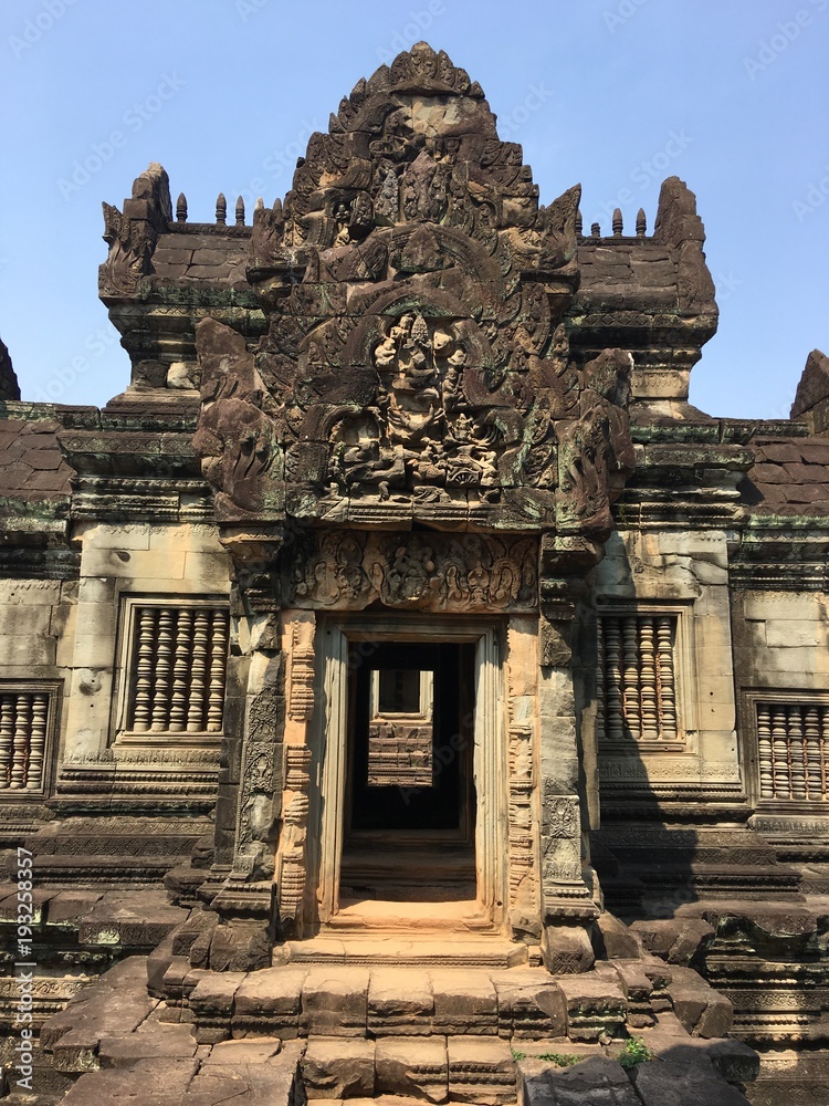 Naklejka premium Angkor Wat in Siem Reap, Cambodia. Ancient Khmer stone temple ruins in jungle forest