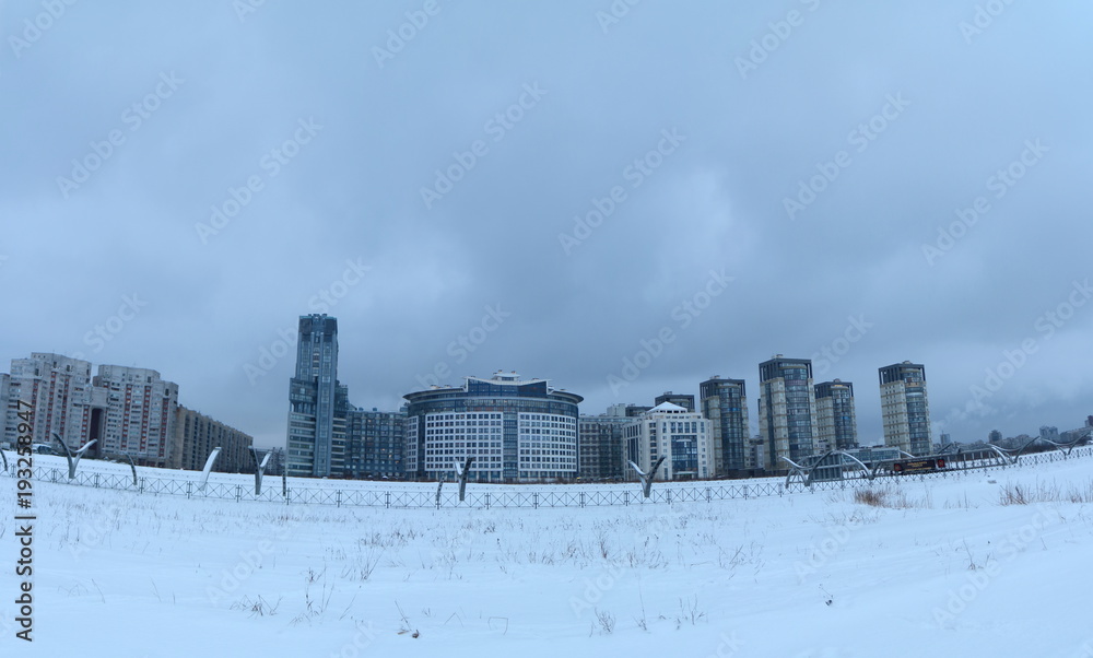 Fototapeta premium panorama of the residential quarter on the outskirts of the city on a winter evening