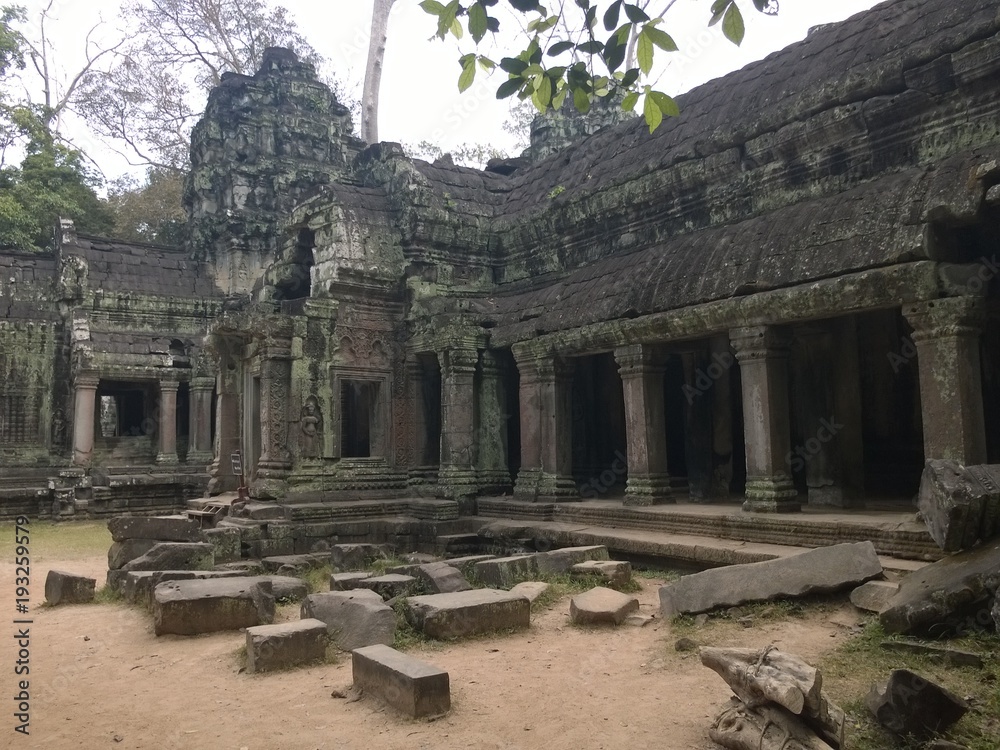 Fototapeta premium Angkor Wat in Siem Reap, Cambodia. Ancient Khmer stone temple ruins in jungle forest