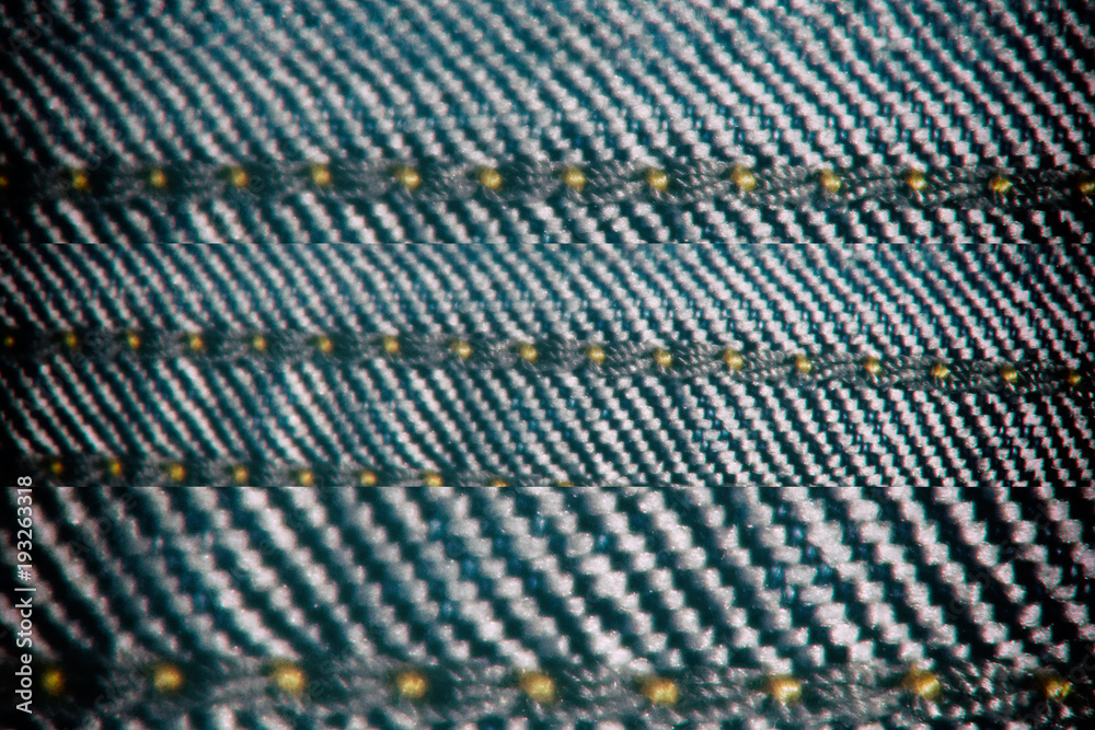 Naklejka premium Denim texture with beige seam for jeans background