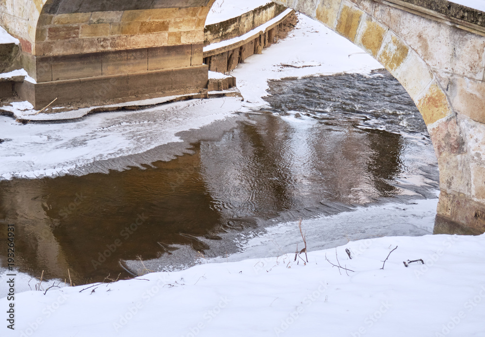custom made wallpaper toronto digitalWinter. River under the stone arch of the old bridge.
