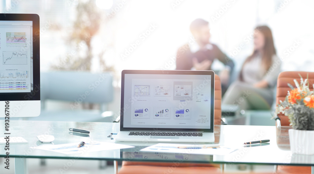 monitors on the desktop in a modern office.business background. monitors on the desktop in a modern office.business background.