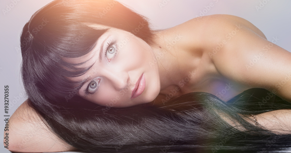 Portrait of young beauty woman looking away