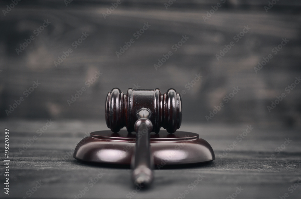 Judge Gavel on a black wooden background. Judge Gavel on a black wooden background.