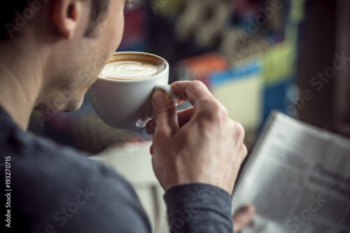 Drinking espresso