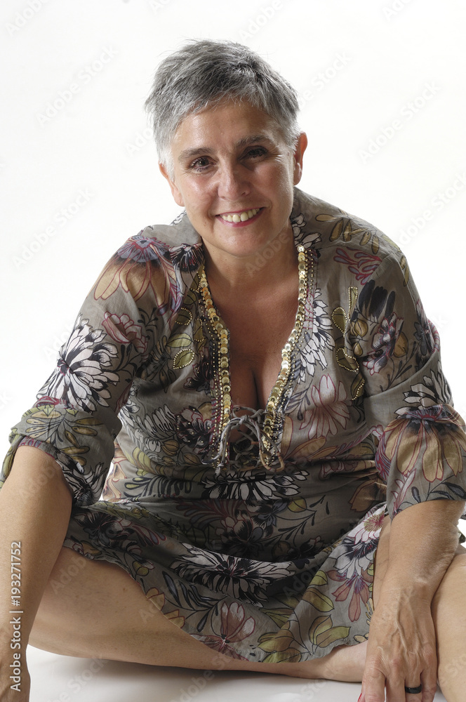 portrait of an elderly woman sitting on the floor portrait of an elderly woman sitting on the floor