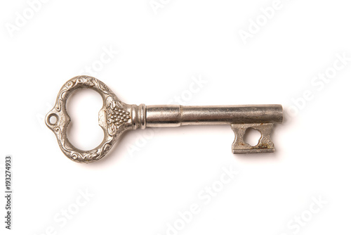 Vintage silver key isolated on white background