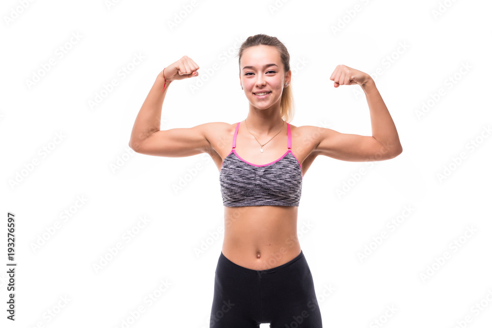 Sport young woman with perfect body showing biceps, fitness girl over white background Sport young woman with perfect body showing biceps, fitness girl over white background