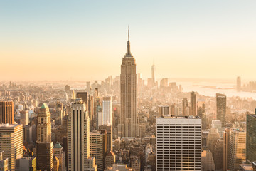 Wandcirkels Empire State Building Manhattan skyline bij gouden zonsondergang  © kasto