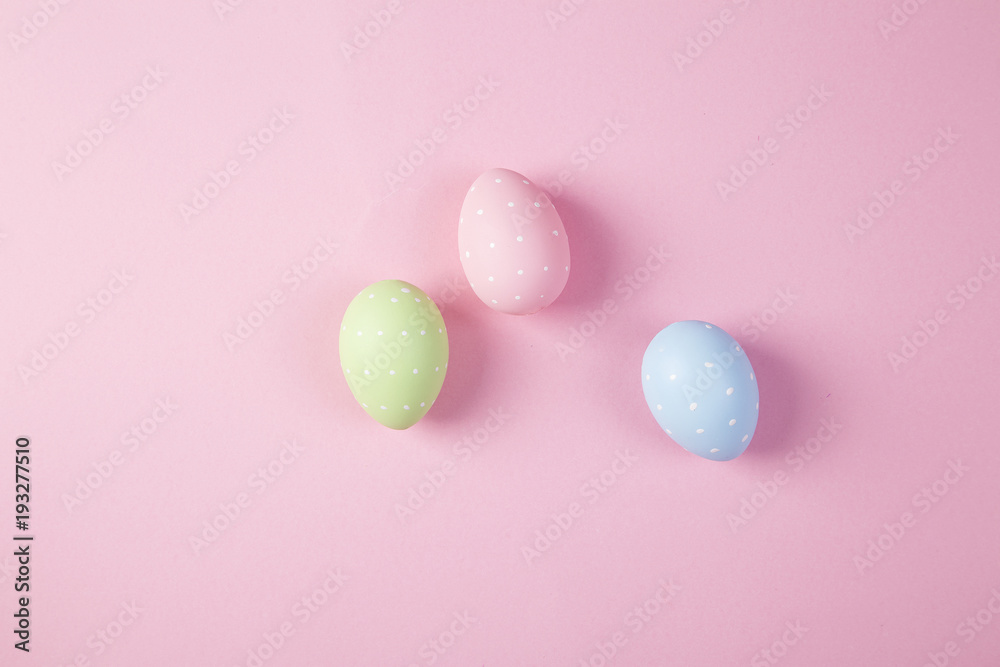 Easter eggs background on the pink background 