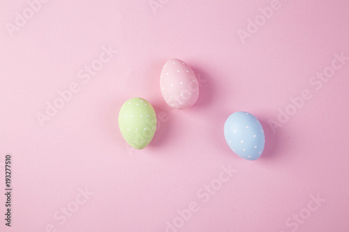 Easter eggs background on the pink background 