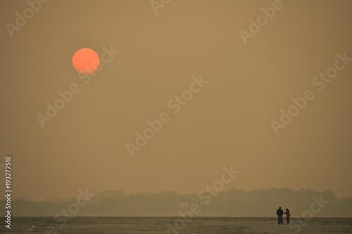 Sunrise with red sun photo