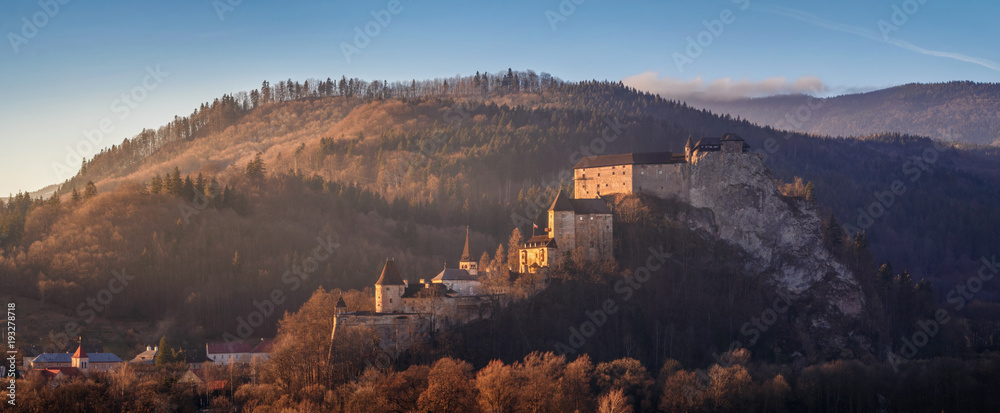 Beautiful sunset over Orava Castle - is situated on a high rock above Orava river in the village of Oravský Podzámok, Slovakia.