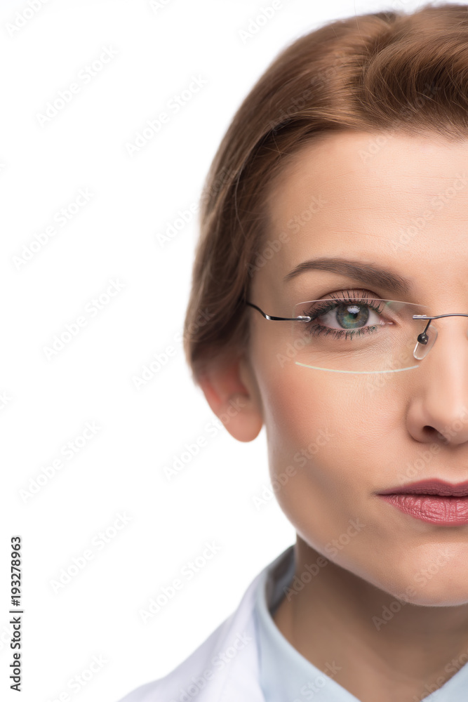 Close-up view of confident female doctor wearing glasses isolated on white Close-up view of confident female doctor wearing glasses isolated on white