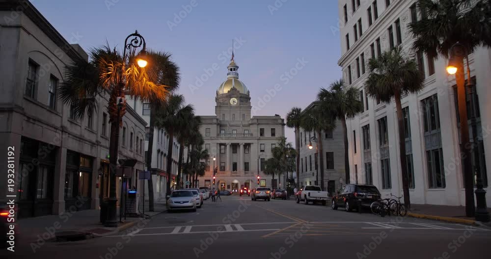 SAVANNAH, GA - Circa February, 2018 - A dusk exterior (DX) establishing shot of the Savannah city hall building.  