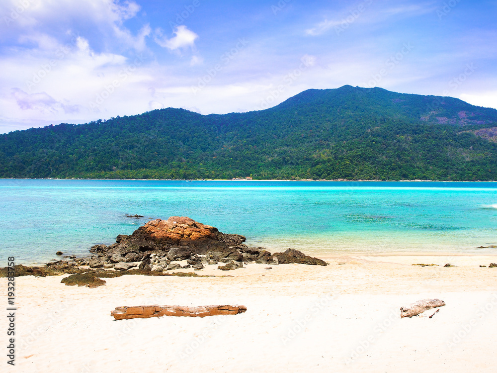 White sand beach and blue sea with clear sky in sunny summer day for holiday or vacation concept,Koh Lipe ,Thailand.