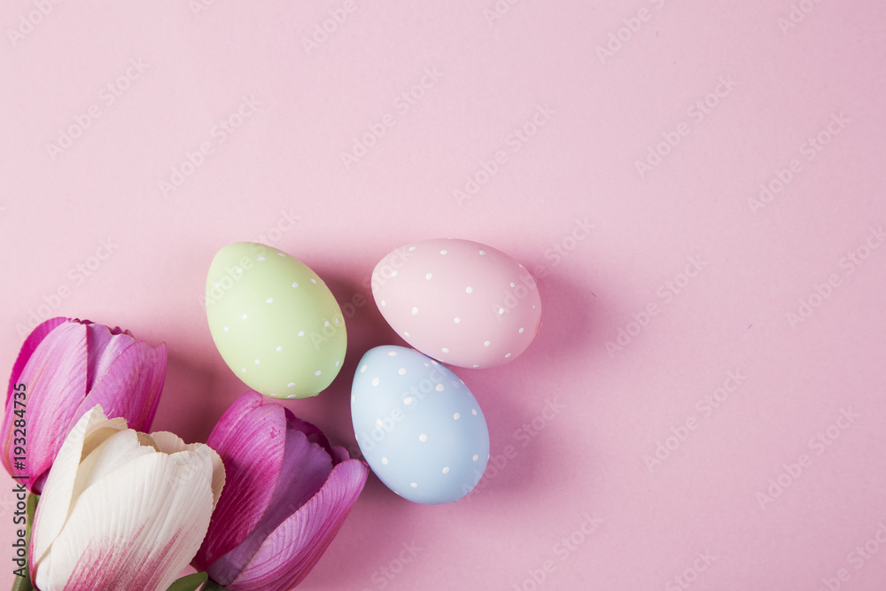 Pastel-coloured tulips and easter-eggs 