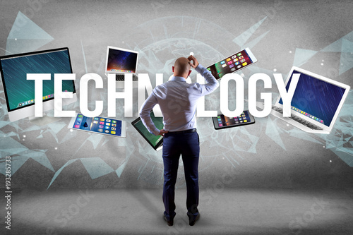 Technology title surounded by device like smartphone, tablet or laptop - Internet and communication concept