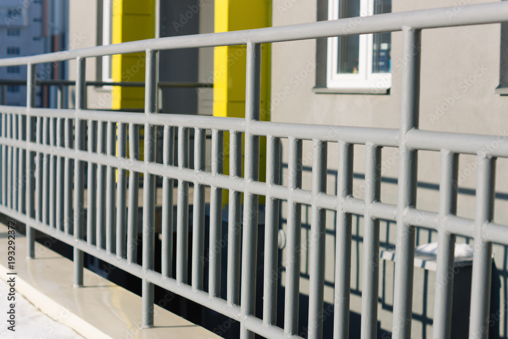 Grey guardrail on the street