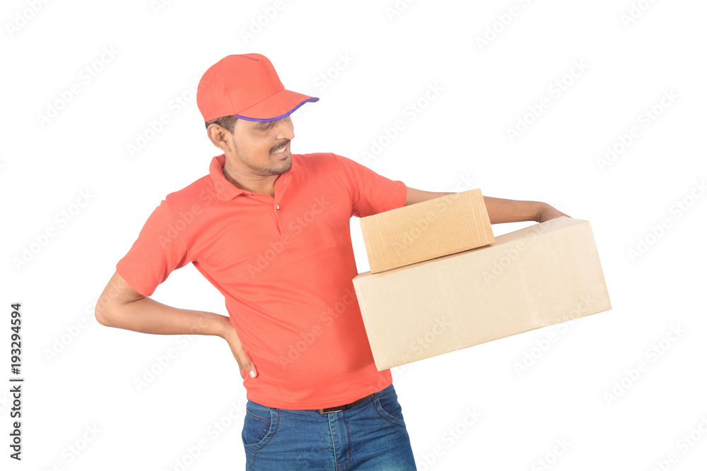 Delivery man holding carton boxes in uniform Delivery man holding carton boxes in uniform