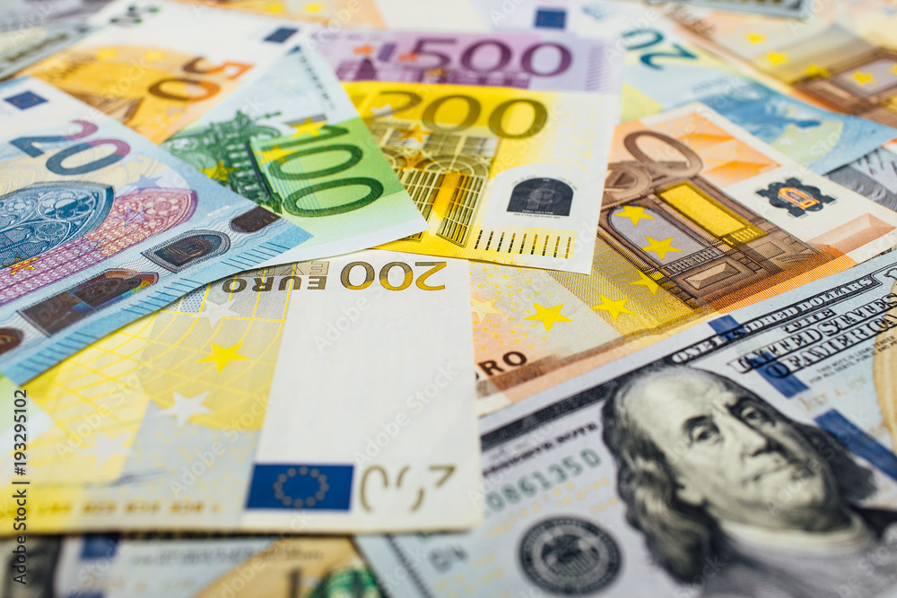 Close-Up of american US dollars and euros Close-Up of american US dollars and euros