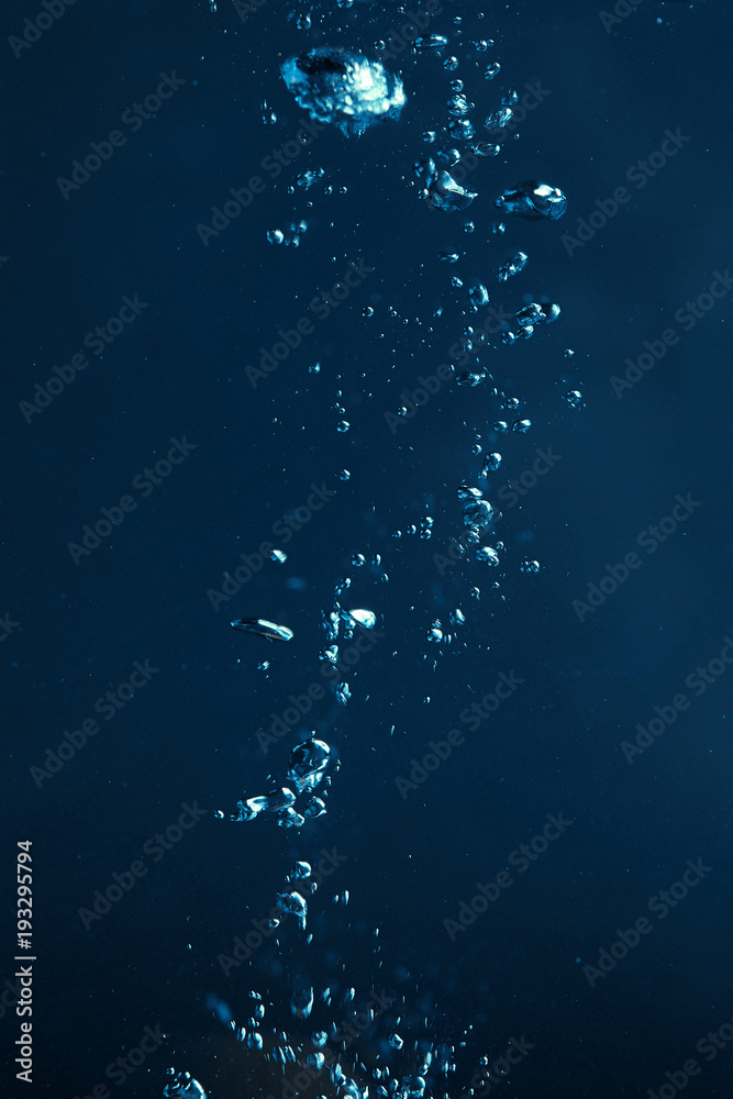 full frame of dark water with bubbles background full frame of dark water with bubbles background