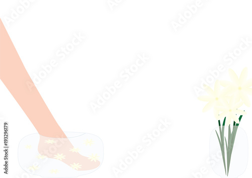 Woman leg in transparent water bowel with flowers