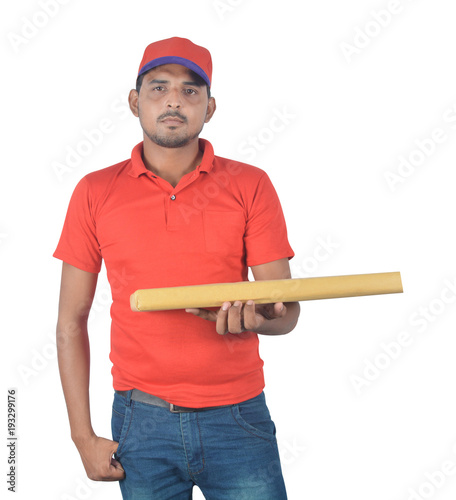Happy delivery man holding gift pack hand in pocket in uniform