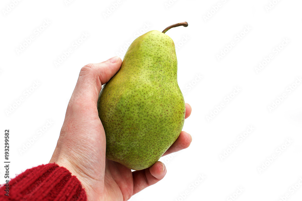 Pear in hand on a white background. Fruit Pear in hand on a white background. Fruit