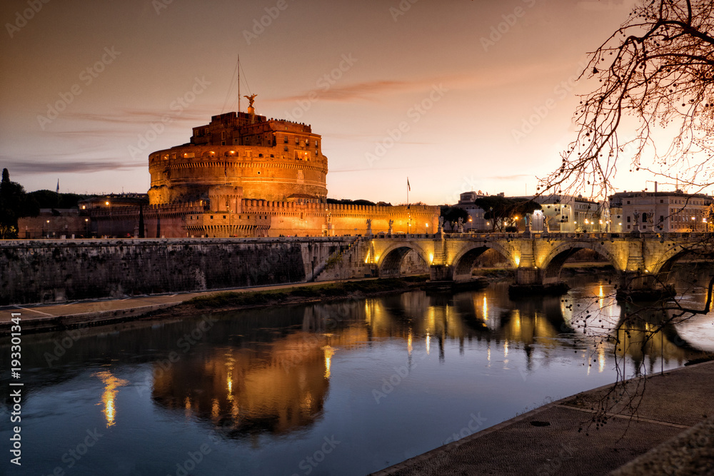 Sant' Angelo Castle and Tiber River in Rome, Italy by night
