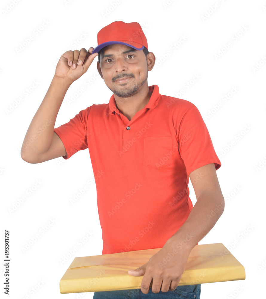 Happy delivery man holding courier hand on cap in uniform Happy delivery man holding courier hand on cap in uniform