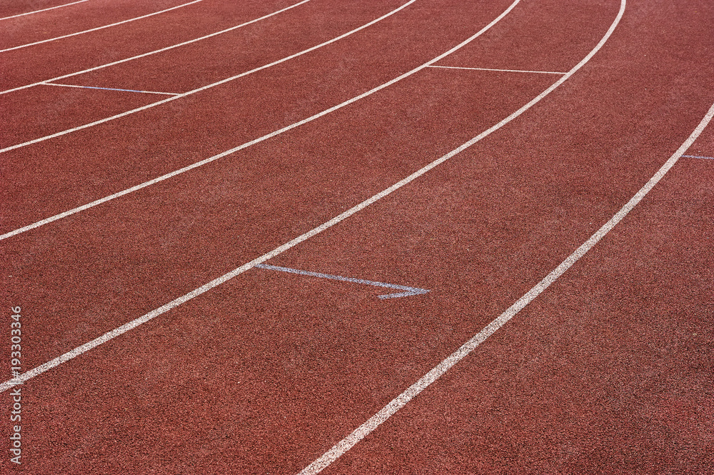 Red running track in stadium. Part of red running track
