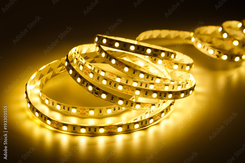Diode strip. Led lights tape on a dark background.
Diode strip. Led lights tape on a dark background.