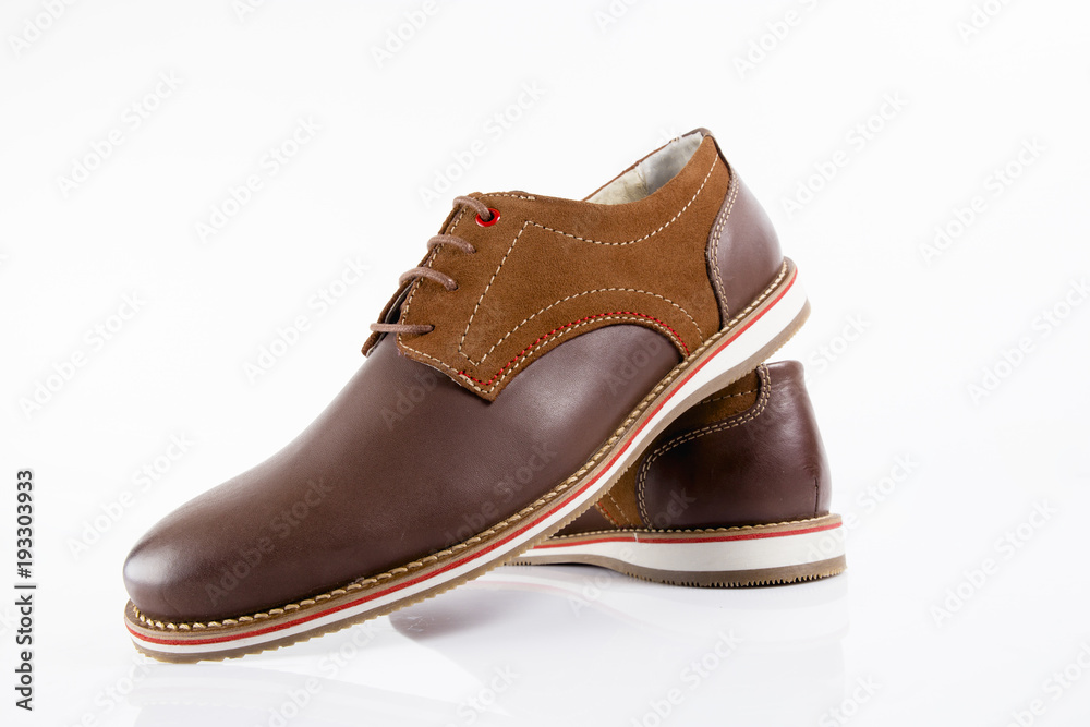 Male brown leather shoe on white background, isolated product, comfortable footwear.