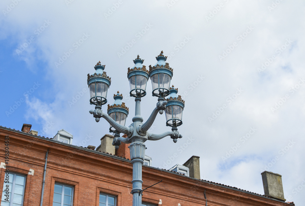 Lampader on the background of a brick building Lampader on the background of a brick building