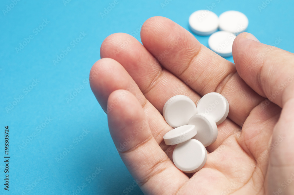 Closeup Of Woman Hands Holding Painkiller Pills. Closeup Of Woman Hands Holding Painkiller Pills.