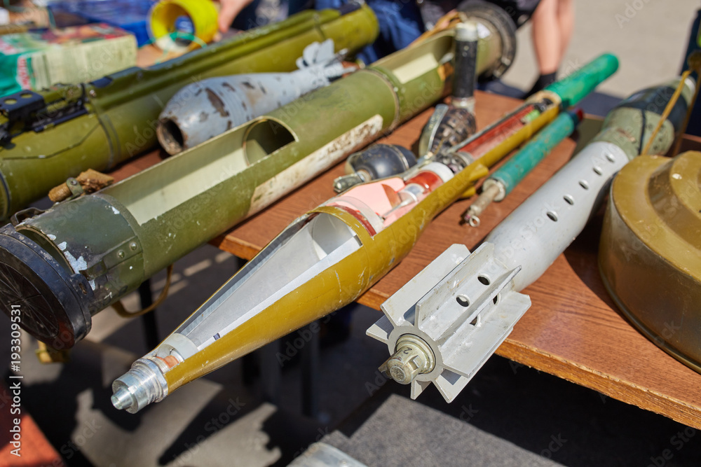 A mortar mine and a hand grenade launcher at the stand. A mortar mine and a hand grenade launcher at the stand.
