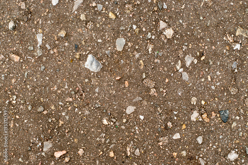 ground under asphalt with stones