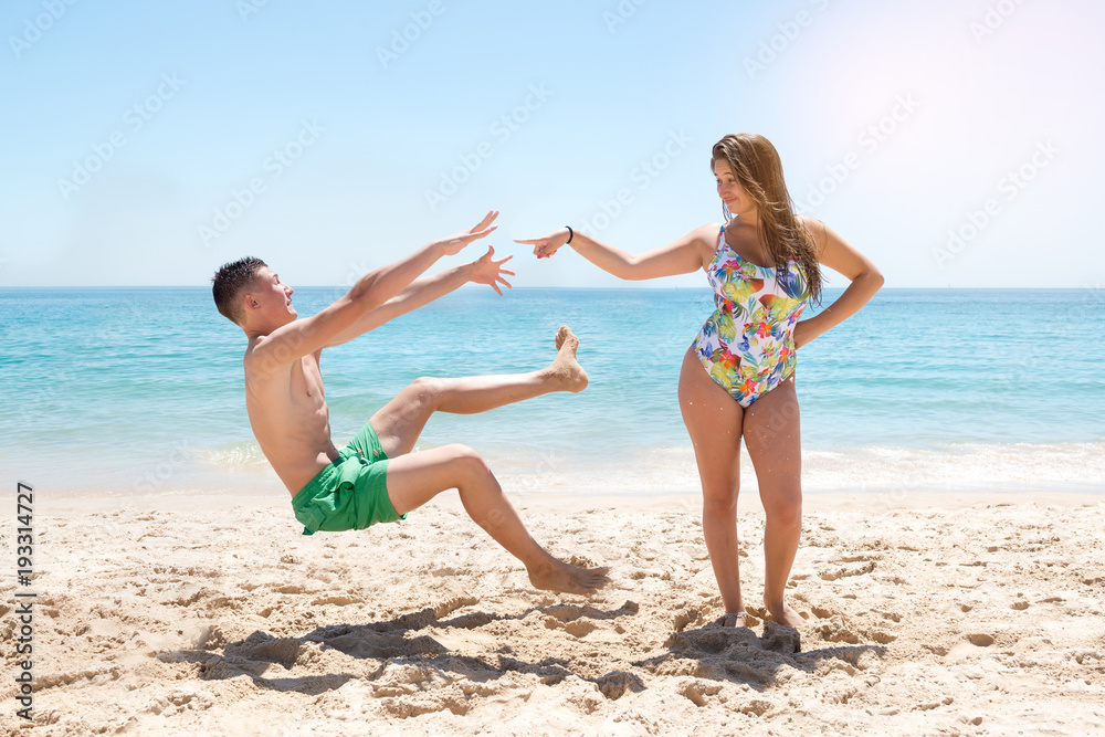 Girl pushing boy Girl pushing boy