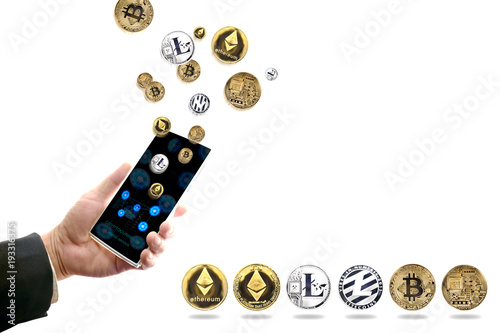 Cryptocurrency / View of hand of business man holding smartphone with crypto currency flying on white background.