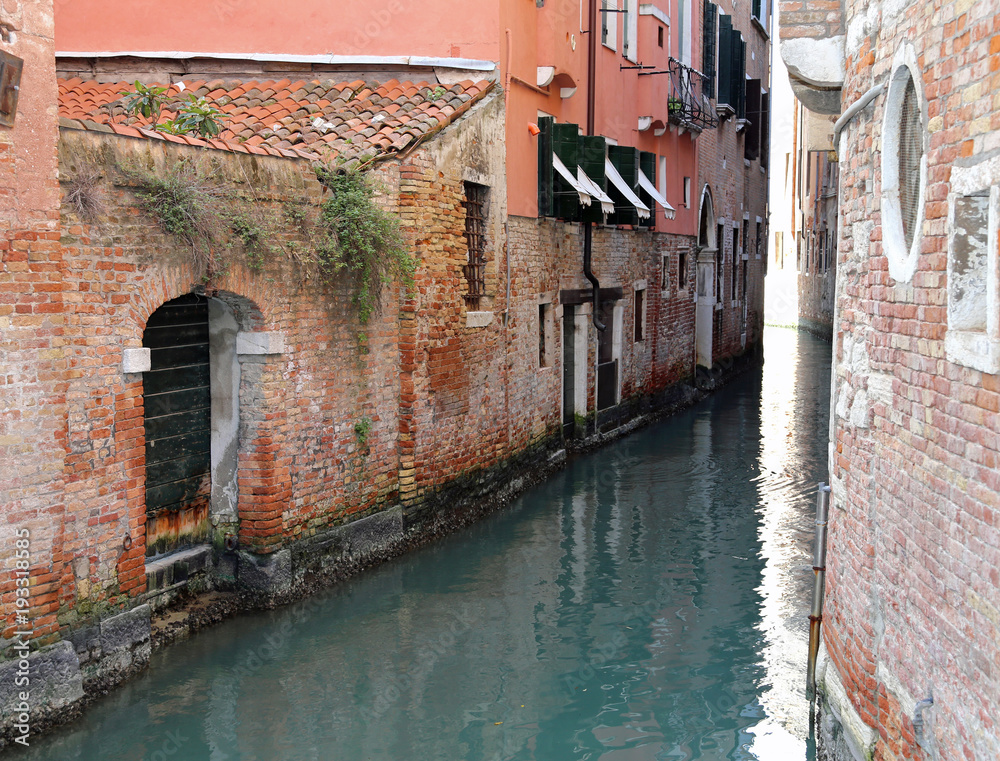 Venice Italy A Narrow Canal with old houses