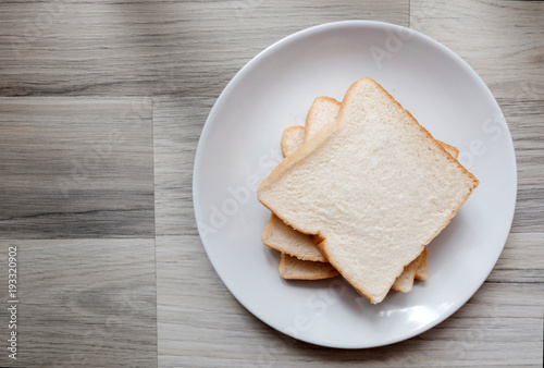 Toasted 3 slice of bread on white plate