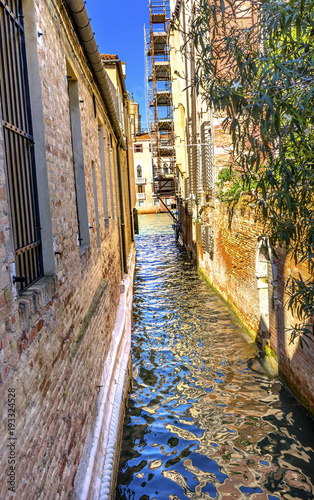 Fototapeta Naklejka Na Ścianę i Meble -  Colorful Small Side Canal Venice Italy