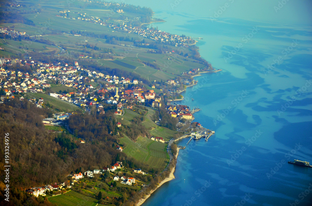 Aerial view of Meersburg, its ferry port and vineyards at Lake Constance, South  Germany in spring