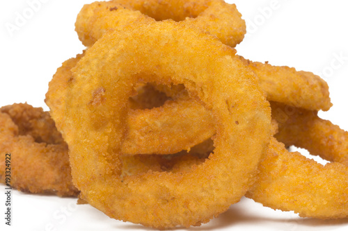 Onion rings in white background close photo