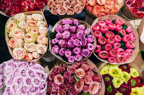 large assortment of flowers and bouquets on the market