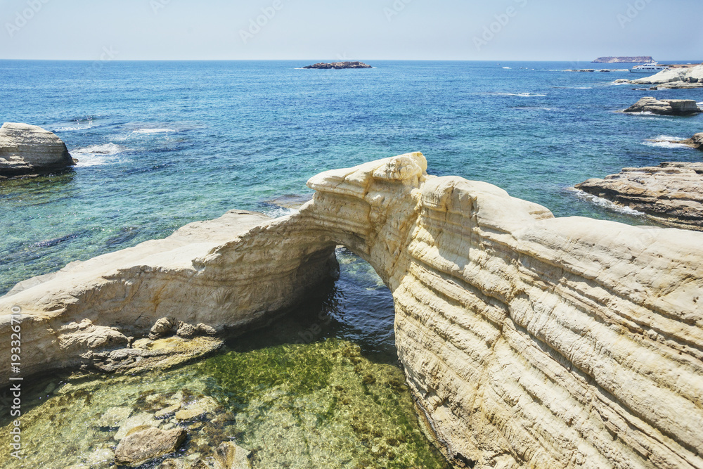 Stone arch near Paphos. Cyprus landscape. White cliffs