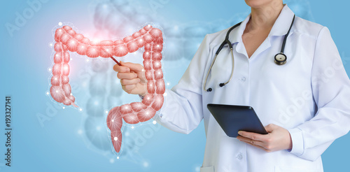 Tableau sur toile Doctor shows colon on virtual screen .